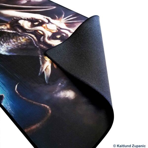 close up of the rubber backing and black stitching on a 1.5mm (1/16") custom printed mat