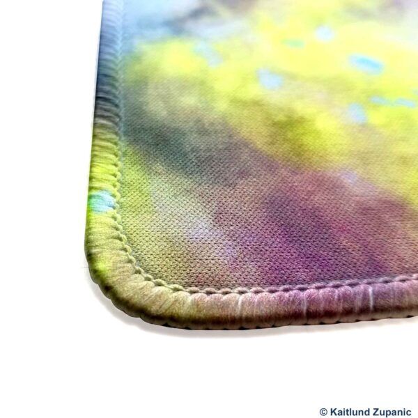 close up of the fabric surface and sublimated stitching on a 2.5mm (1/8") custom printed mat