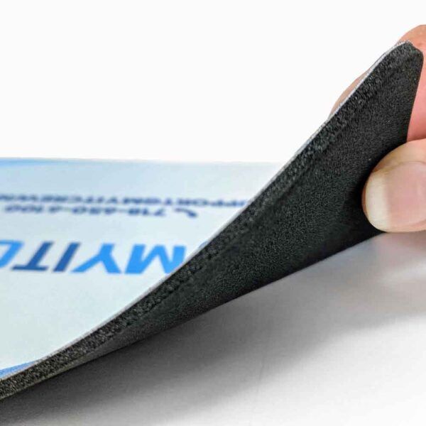 close up of 1/8" latex free foam backing on a plastic pad